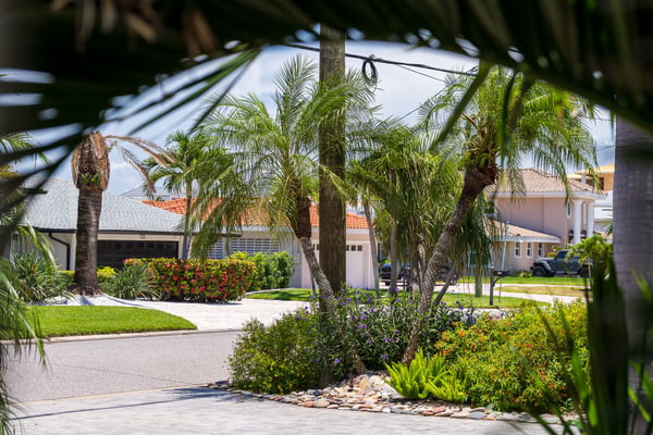 frony yard paver driveway landscape beds