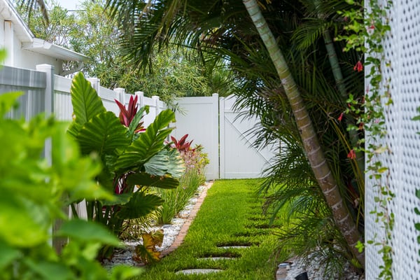 green lawn grass stepping stones landscape beds 1