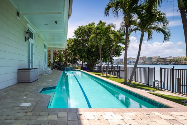 paver patio around pool water