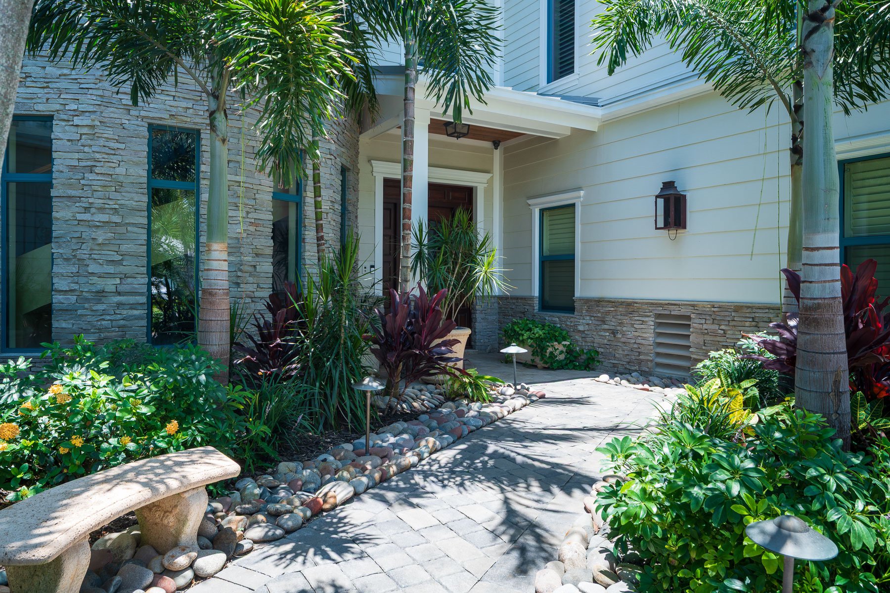 paver walkway front of house landscape beds