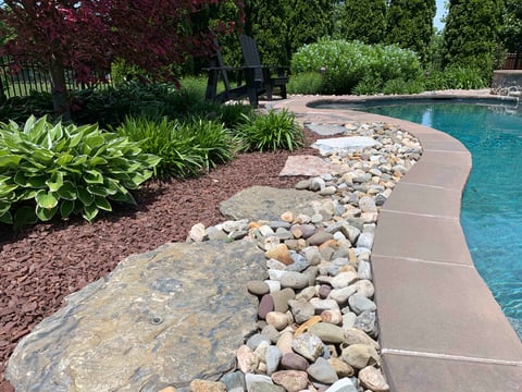 decorative stone gravel by pool