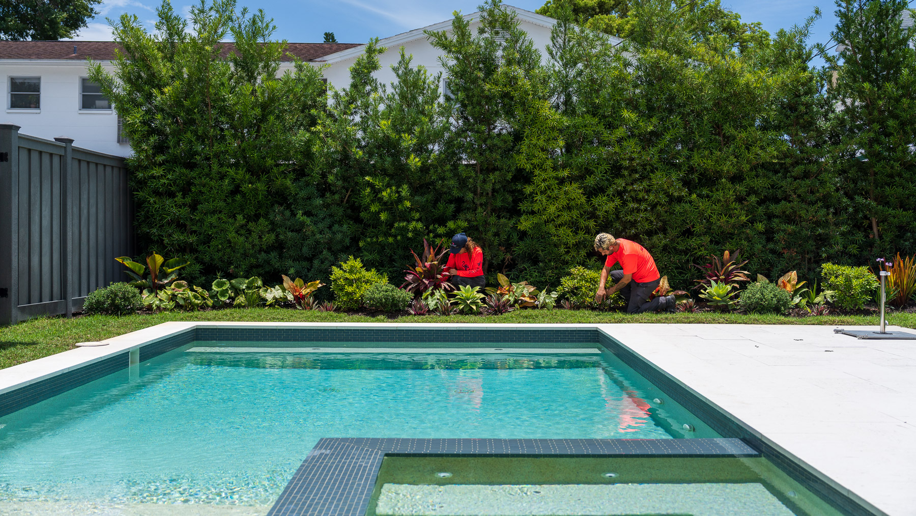 crew cleaning out landscape beds-1